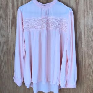 Soft pink tunic with lace and button detail